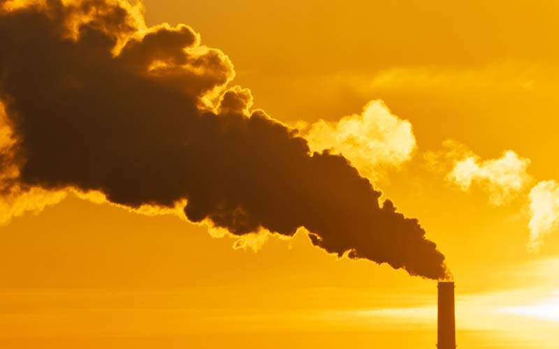 A factory chimney polluting the air.